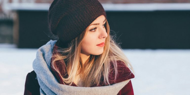 woman wearing black knitted cap